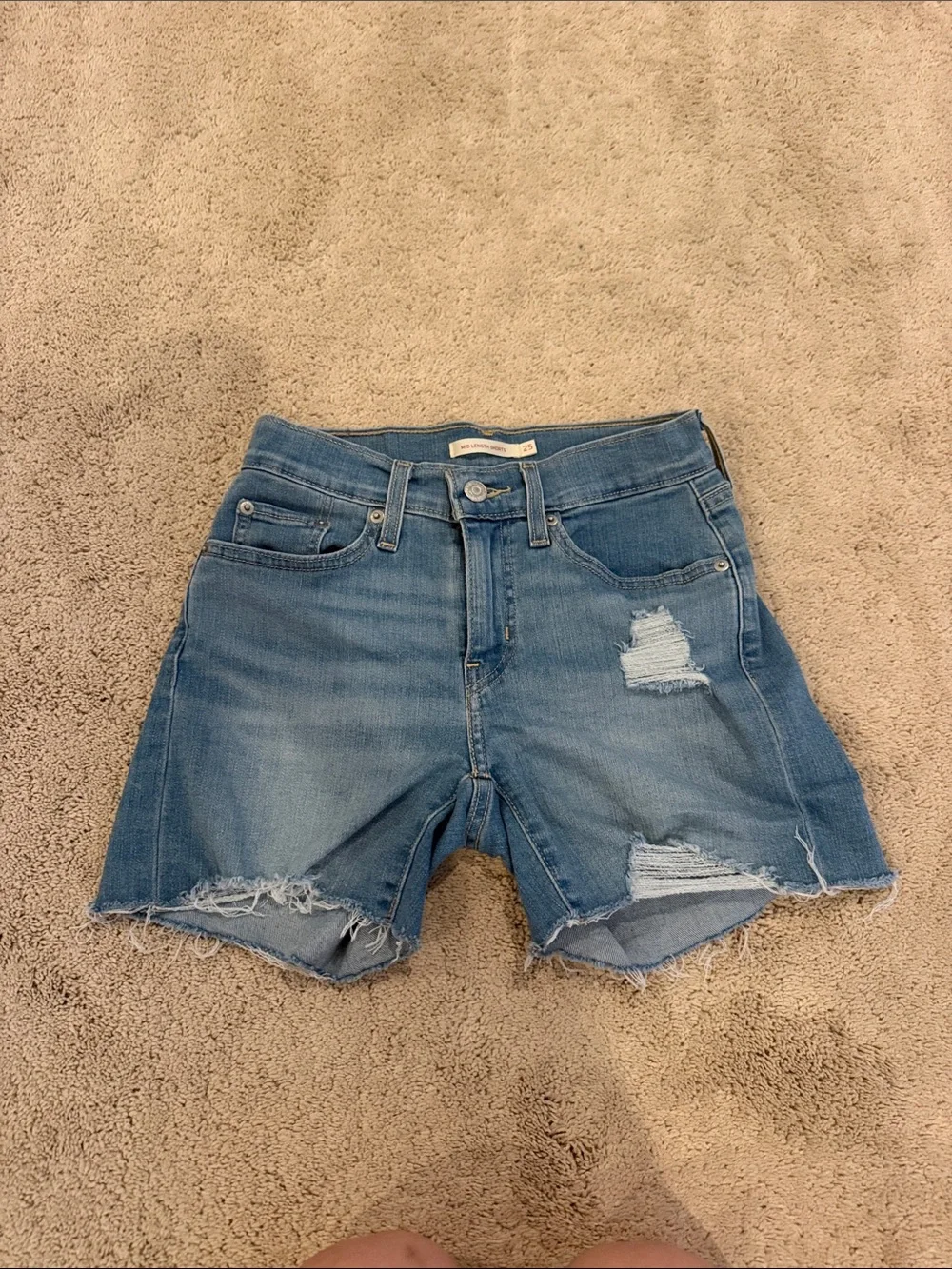 Levi's Light Blue Denim Frayed Hem Shorts - Mid Length in I’m Just a fan